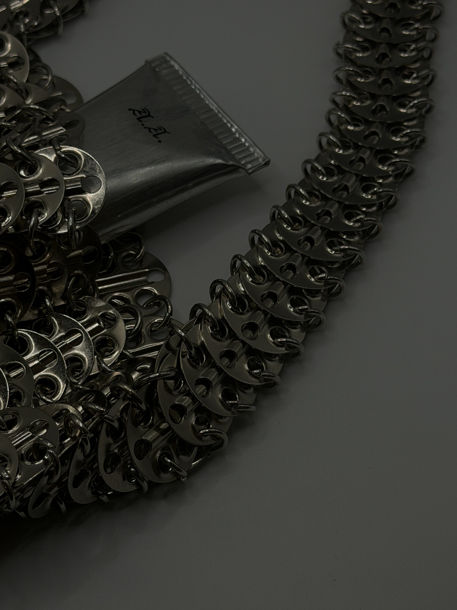ARMOR IN METAL PURSE